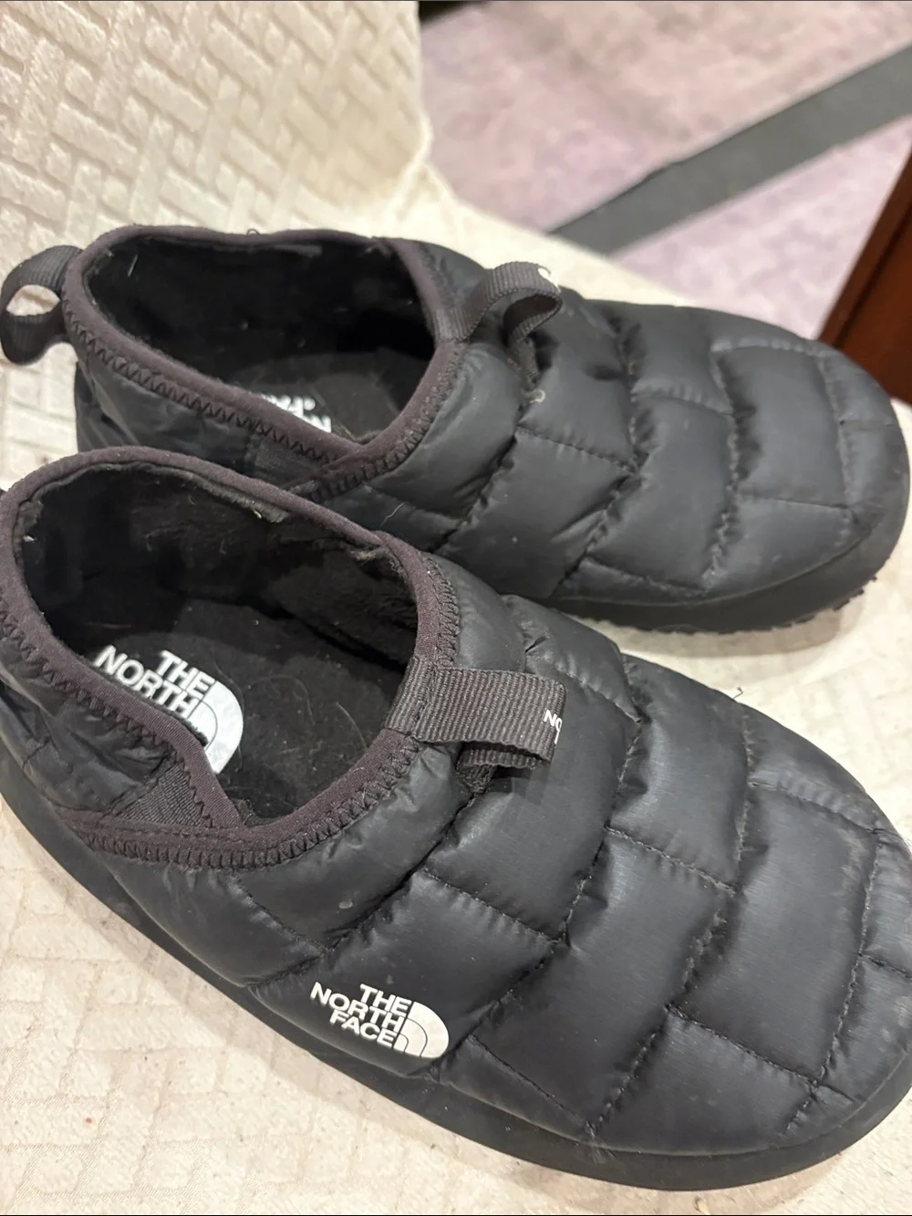 The North Face Black Quilted Puffy Slip-On Mules